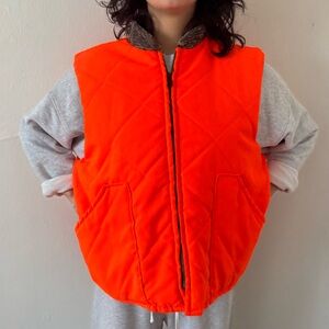 Orange and Camo reversible quilted vest.